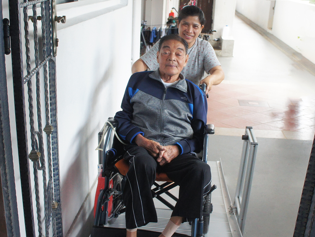 With the ramp, Mr Lim can easily and safely get out of the house for some fresh air.