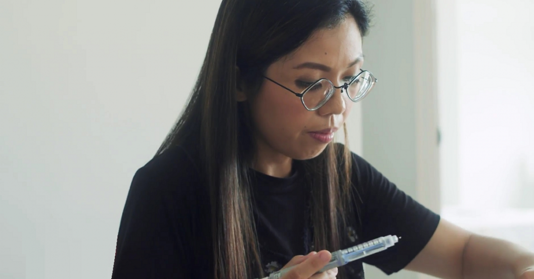 Ms Lee prepping medication Ms Lee prepping medication