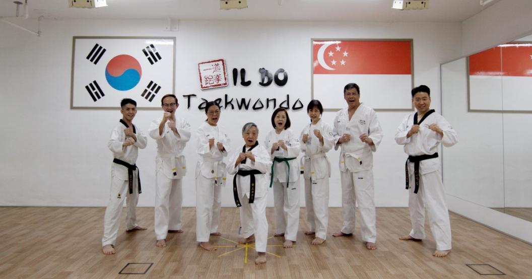 senior and her taekwondo classmates senior and her taekwondo classmates