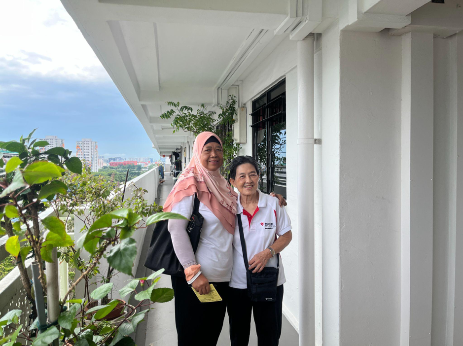 Mdm Sapiah and her buddy volunteer Mdm Sapiah